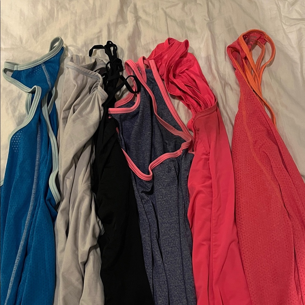 Lot of six work out tank tops from various brands including H&M and C9.